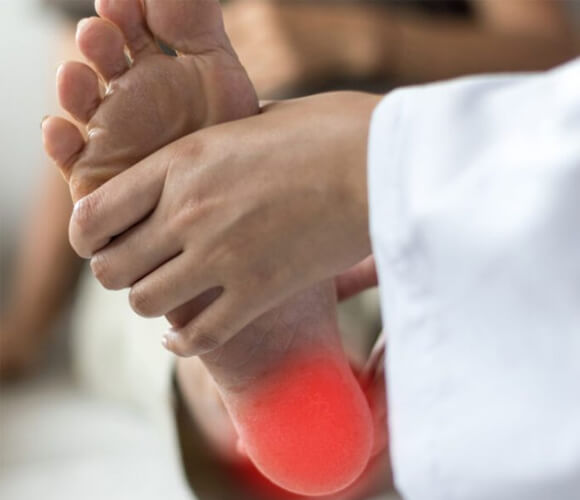 image of doctor examining patients foot